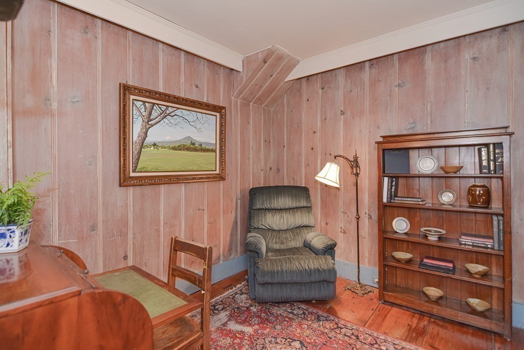 58 Hudson Road Sudbury, MA 01776 - Photo 17 of 42 a living room with furniture a window and bookshelf