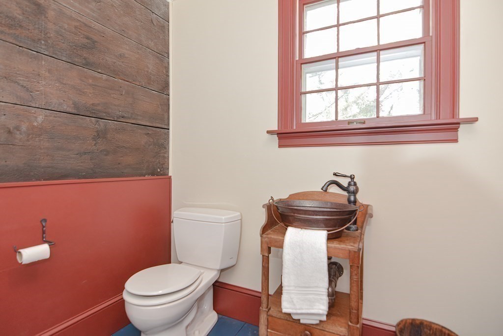 58 Hudson Road Sudbury, MA 01776 - Photo 18 of 42 a bathroom with a toilet and a sink