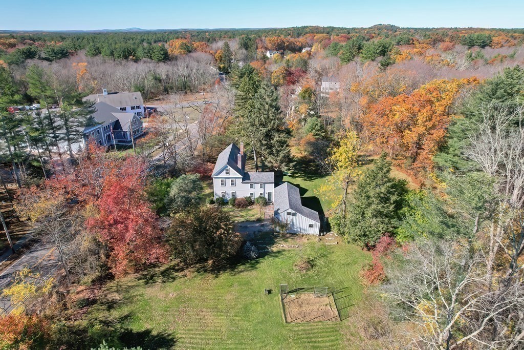 58 Hudson Road Sudbury, MA 01776 - Photo 38 of 42 an aerial view of house with yard and mountain view in back
