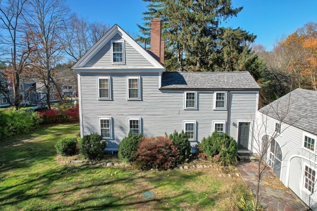 58 Hudson Road Sudbury, MA 01776 - Photo 39 of 42 a front view of a house with a yard