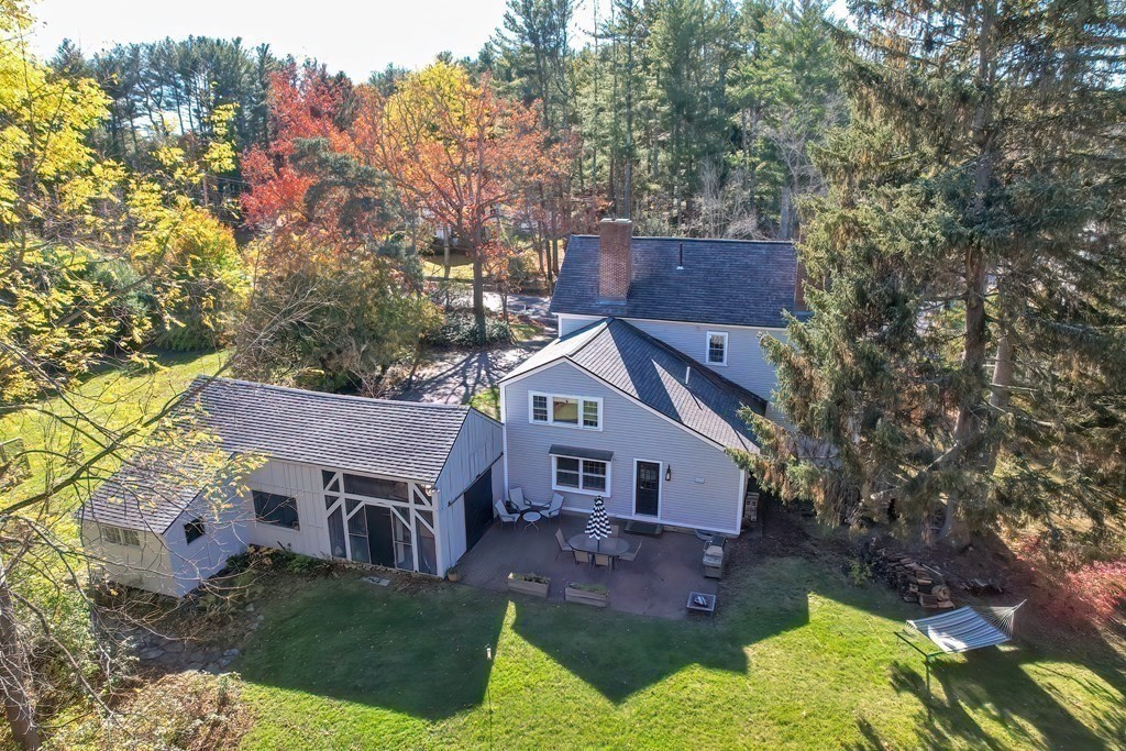 58 Hudson Road Sudbury, MA 01776 - Photo 40 of 42 front view of a house with a yard