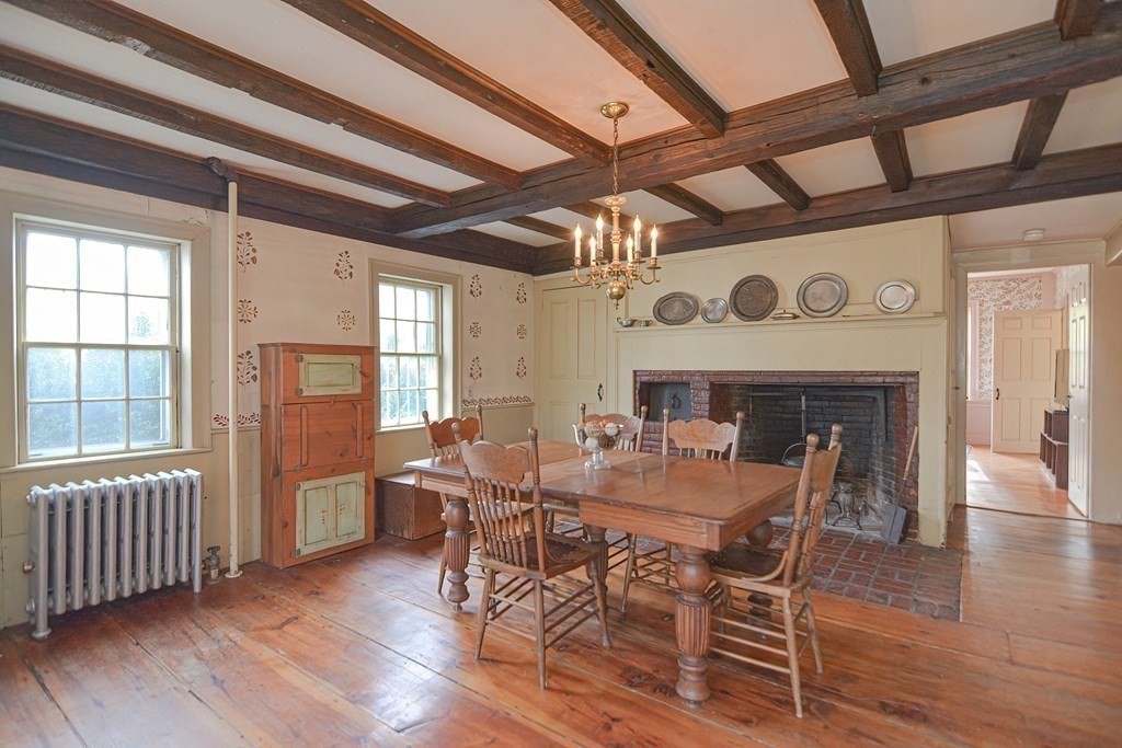 58 Hudson Road Sudbury, MA 01776 - Photo 8 of 42 a view of a dining room with furniture window and wooden floor
