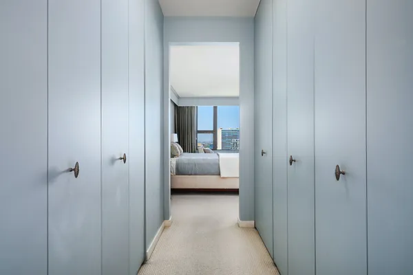 a view of a bedroom from a hallway