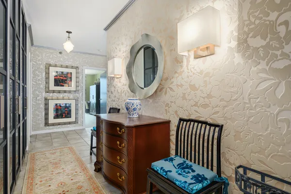 a view of a hallway with a washer and dryer
