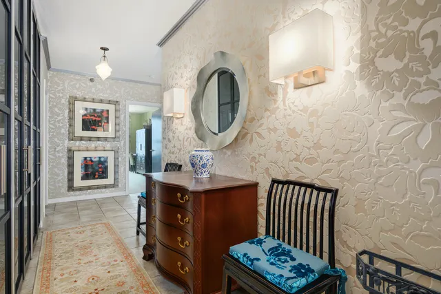 a view of a hallway with a washer and dryer