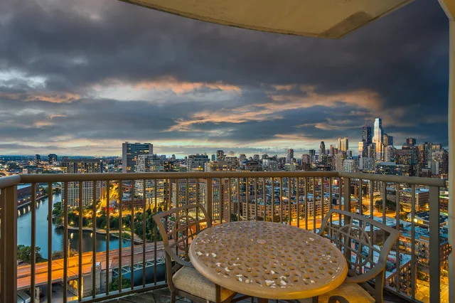 a view of a lake from a balcony