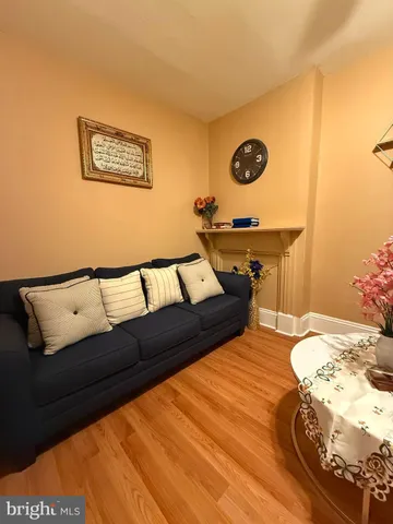 a living room with a couch and a table