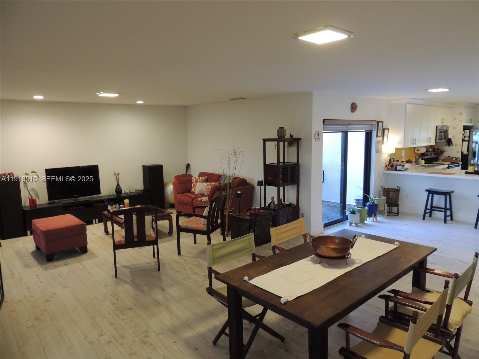 7951 Eastlake Drive, Unit C Boca Raton, FL 33433 - Photo 18 of 46 a view of a dining room with furniture