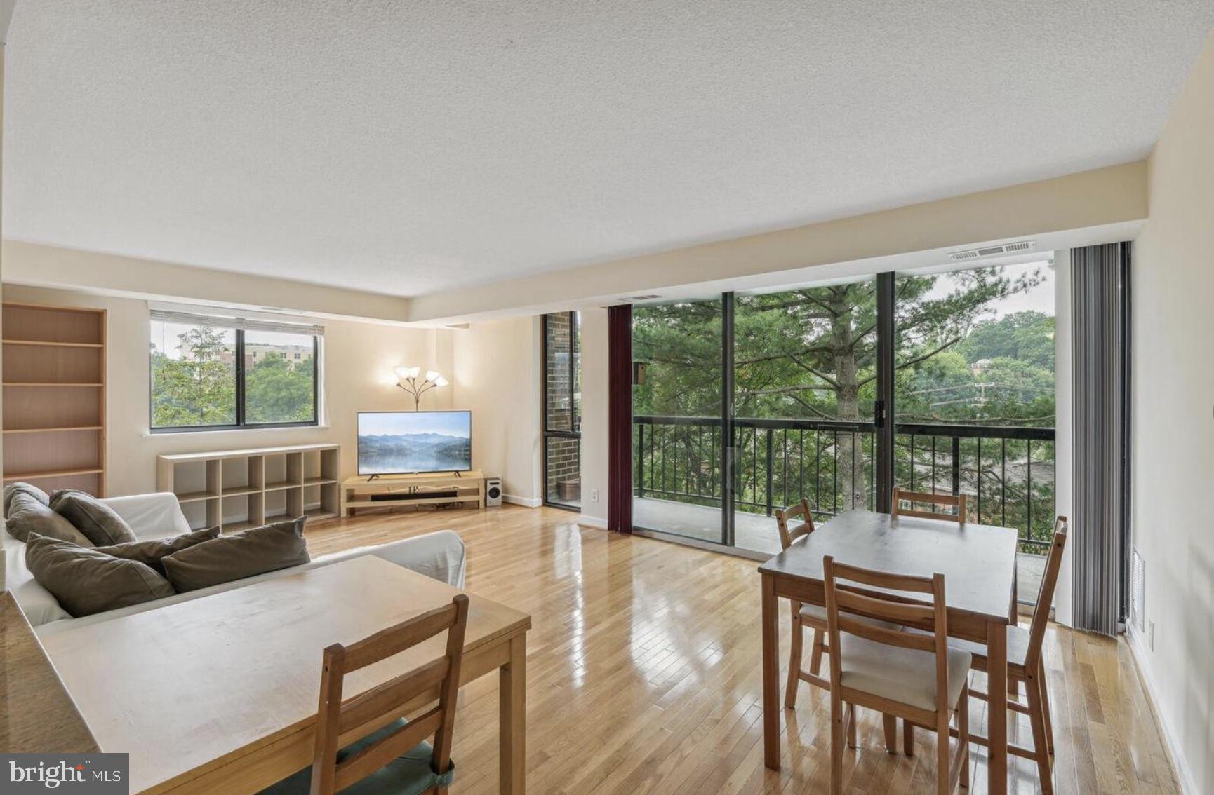 1401 North Rhodes Street, Unit 406 Arlington, VA 22209 - Photo 1 of 14 Bright and airy living space with views.