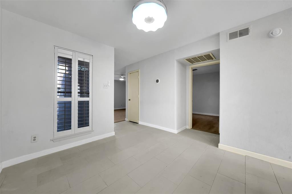 2111 East Belt Line Road, Unit 166B Richardson, TX 75081 - Photo 13 of 23 Spare room with baseboards