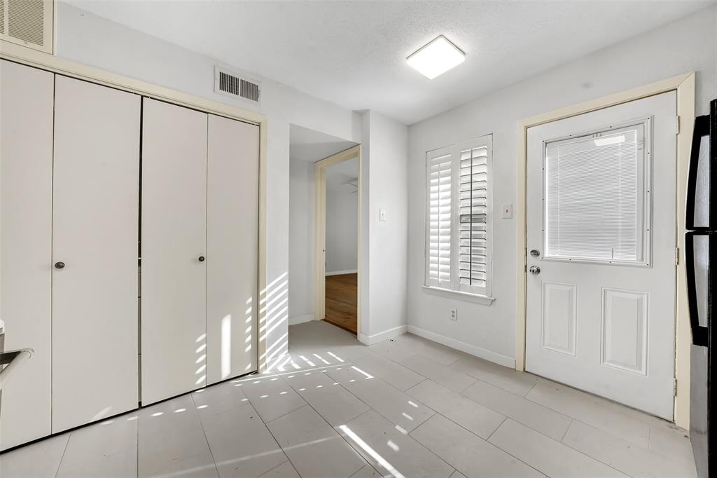 2111 East Belt Line Road, Unit 166B Richardson, TX 75081 - Photo 20 of 23 Foyer entrance with baseboards