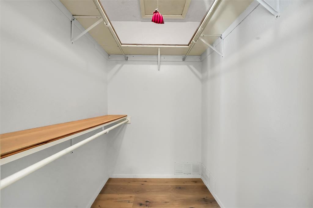 2111 East Belt Line Road, Unit 166B Richardson, TX 75081 - Photo 22 of 23 Walk in closet featuring light wood-style floors and attic access