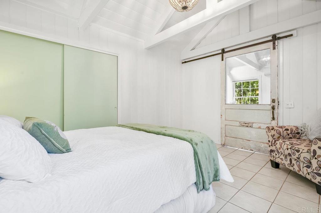 3055 Pera Alta Drive Julian, CA 92036 - Photo 11 of 44 a bedroom with a bed and a window