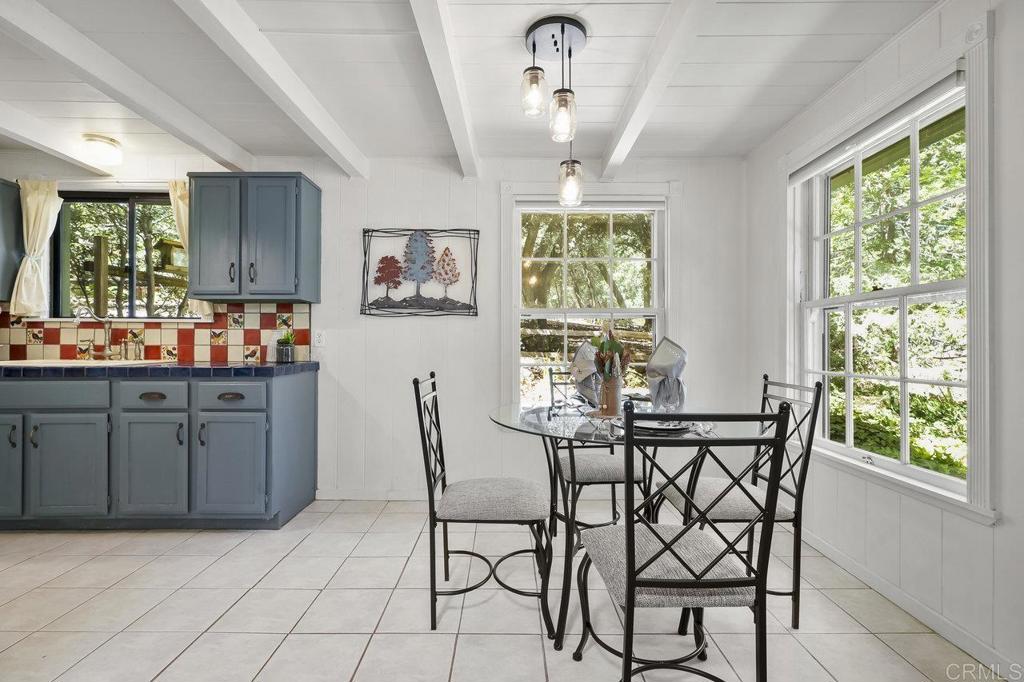 3055 Pera Alta Drive Julian, CA 92036 - Photo 15 of 44 a view of a dining room with furniture window and outside view