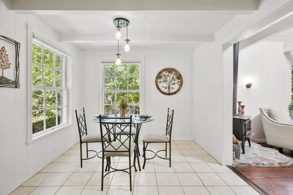 3055 Pera Alta Drive Julian, CA 92036 - Photo 16 of 44 a view of a dining room and kitchen with furniture window and outdoor seating