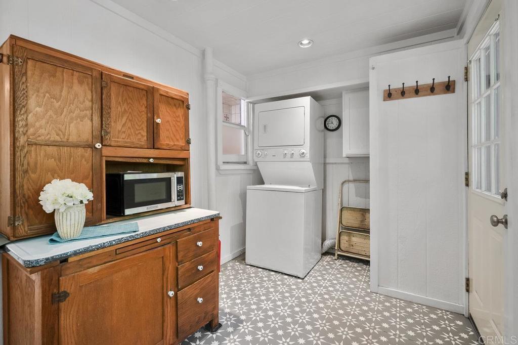 3055 Pera Alta Drive Julian, CA 92036 - Photo 24 of 44 a kitchen with a stove a sink and a refrigerator