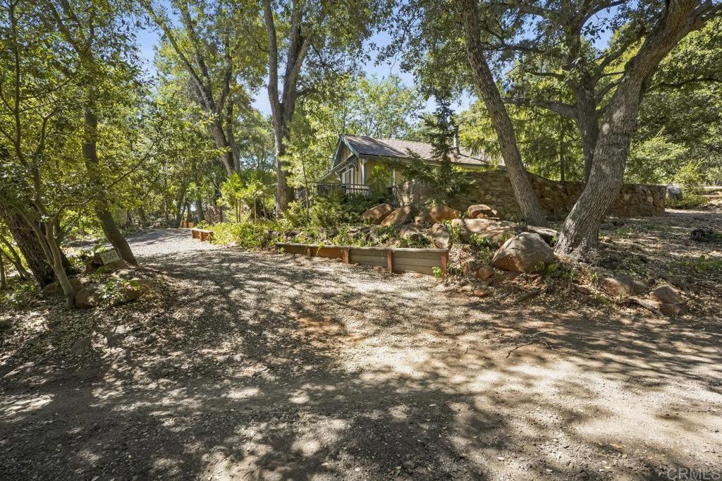 3055 Pera Alta Drive Julian, CA 92036 - Photo 25 of 44 a backyard of a house with lots of green space