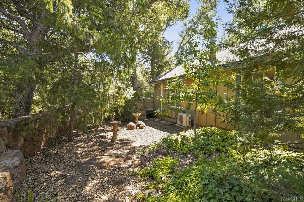 3055 Pera Alta Drive Julian, CA 92036 - Photo 26 of 44 a view of a tree in a backyard of the house