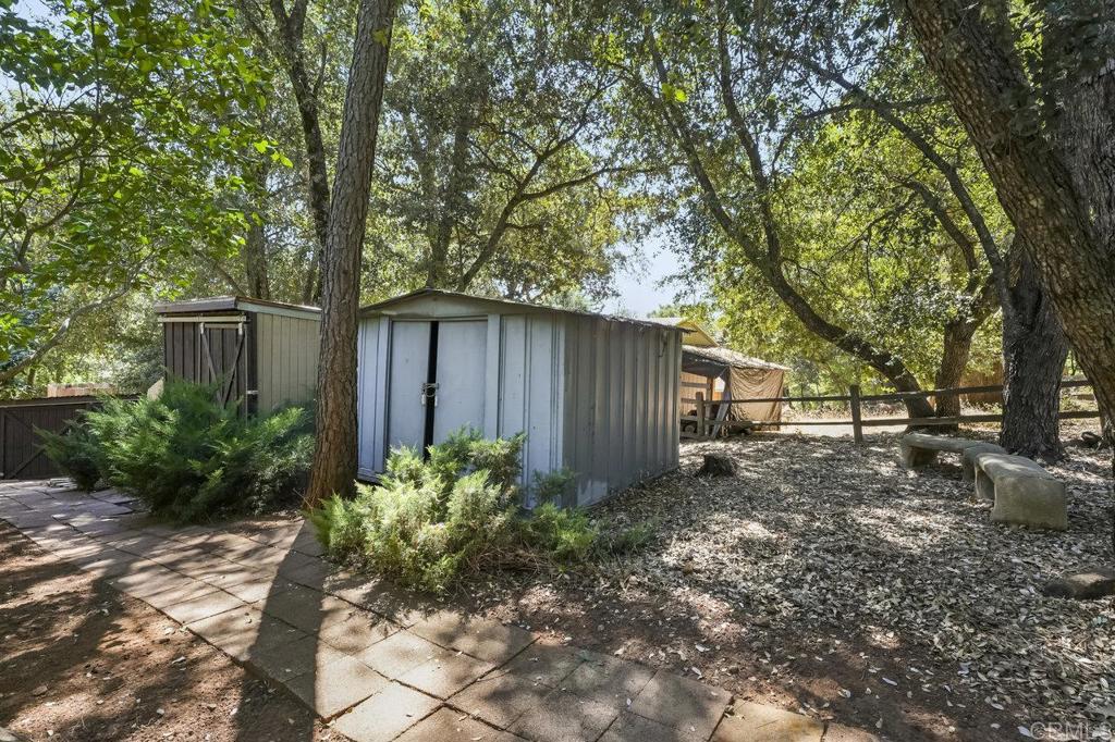 3055 Pera Alta Drive Julian, CA 92036 - Photo 30 of 44 a backyard of a house with lots of green space