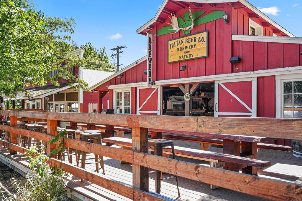 3055 Pera Alta Drive Julian, CA 92036 - Photo 37 of 44 a sign that is on the wall of building