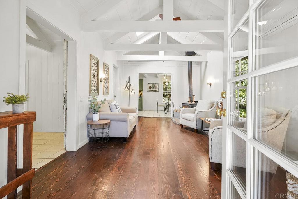3055 Pera Alta Drive Julian, CA 92036 - Photo 6 of 44 a living room with furniture and a wooden floor