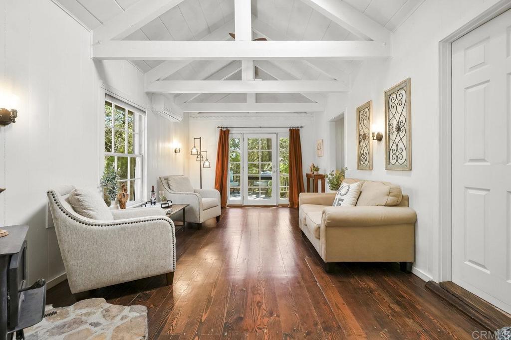 3055 Pera Alta Drive Julian, CA 92036 - Photo 8 of 44 a living room with furniture and a large window