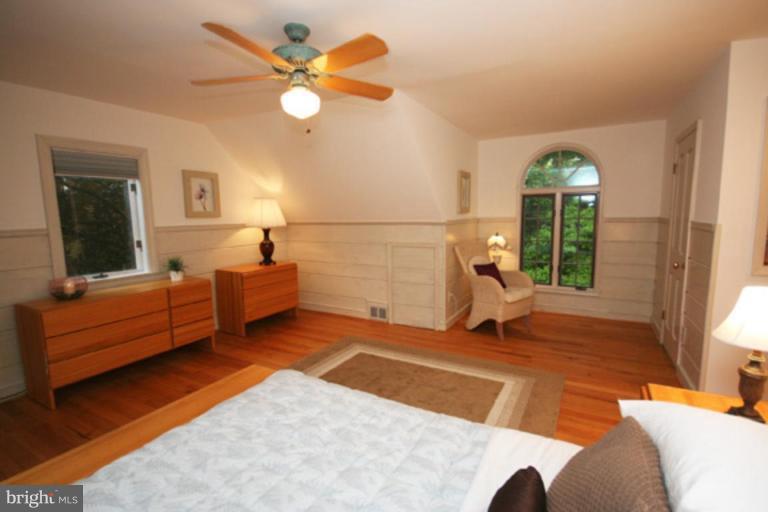9220 Whitney Street Silver Spring, MD 20901 - Photo 11 of 30 a living room with furniture and a large window