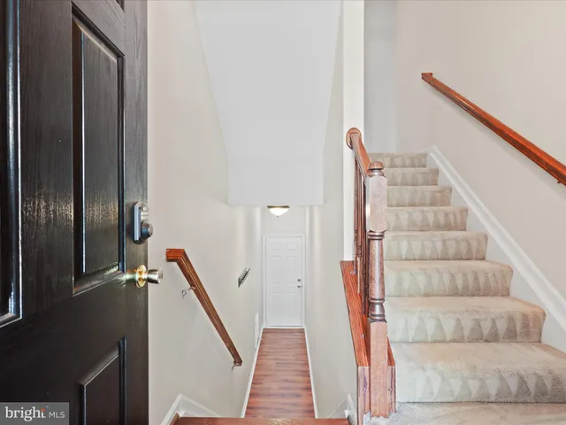 a view of entryway with stairs