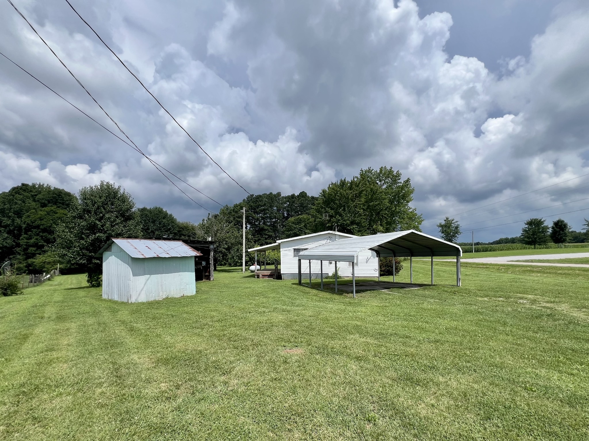3467 Fall River Road Pulaski, TN 38478 - Photo 15 of 38 a aerial view of a house with swimming pool and green space