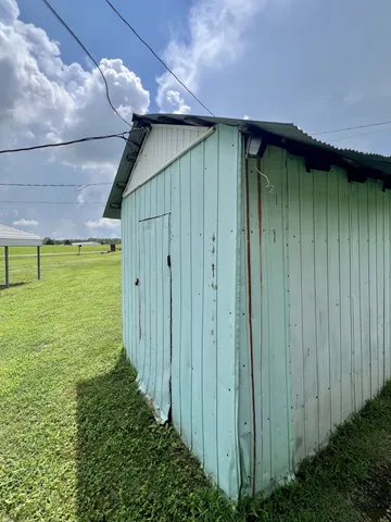 a yellow house with outdoor space
