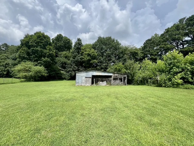 a house with trees in front of it