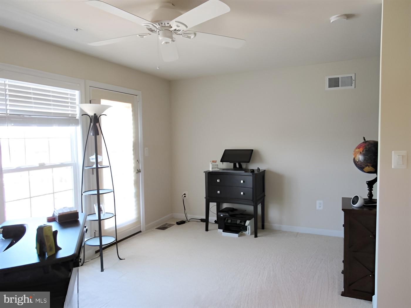 42581 Sunset Ridge Square Ashburn, VA 20148 - Photo 17 of 24 Bright and airy living space awaits.