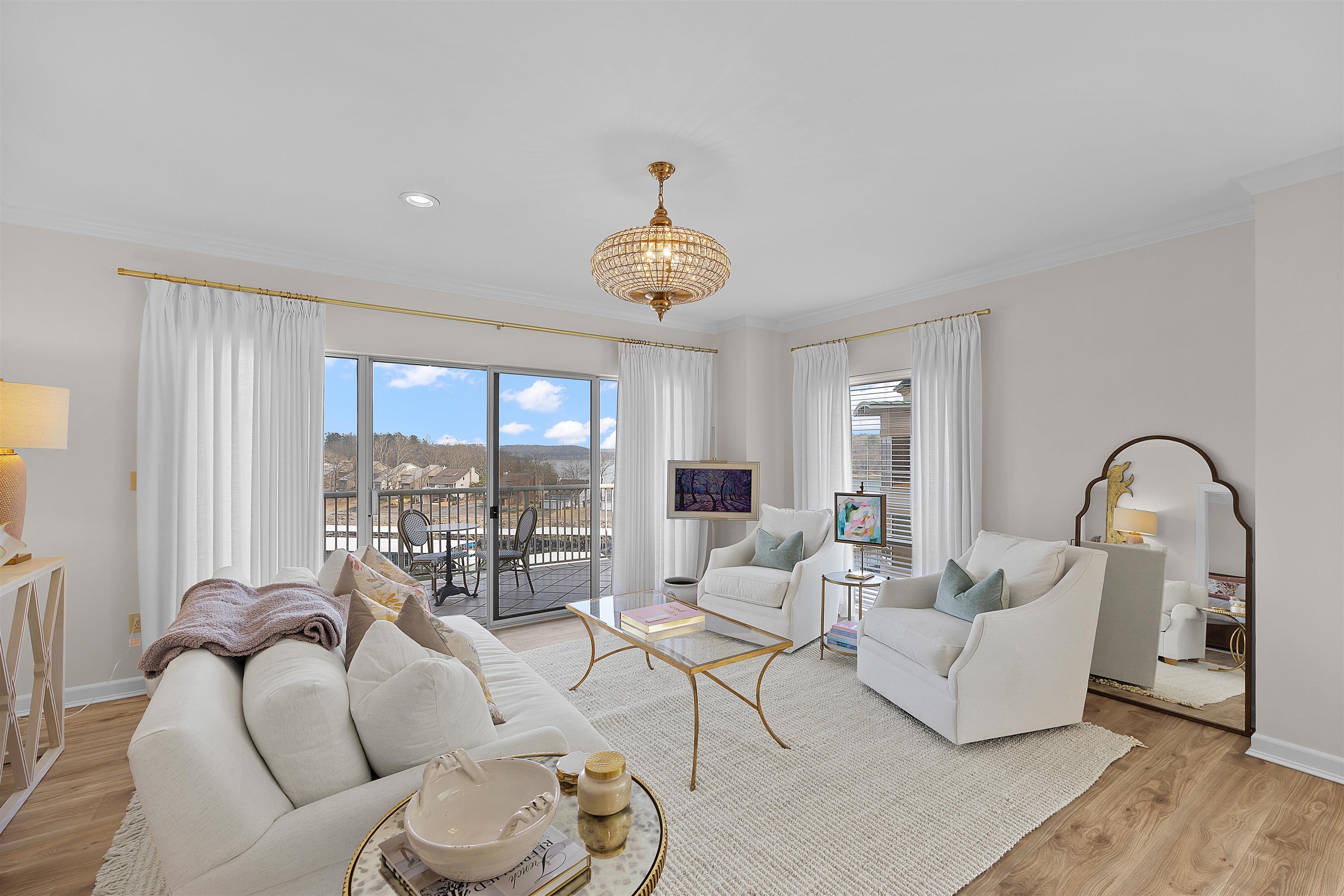 323 Cr 380 Road, Unit P 605 Iuka, MS 38852 - Photo 11 of 24 a living room with furniture and a large window