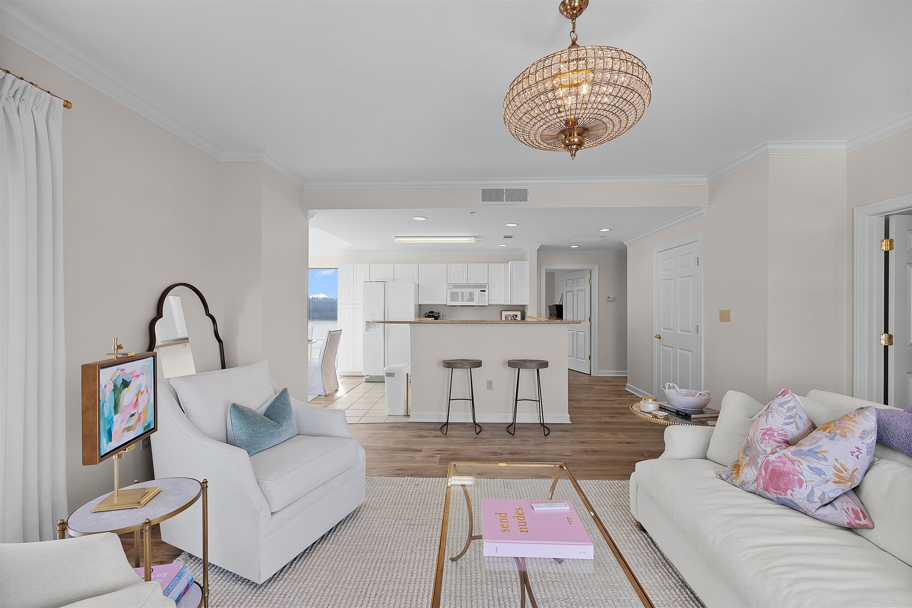 323 Cr 380 Road, Unit P 605 Iuka, MS 38852 - Photo 13 of 24 a living room with furniture and a chandelier