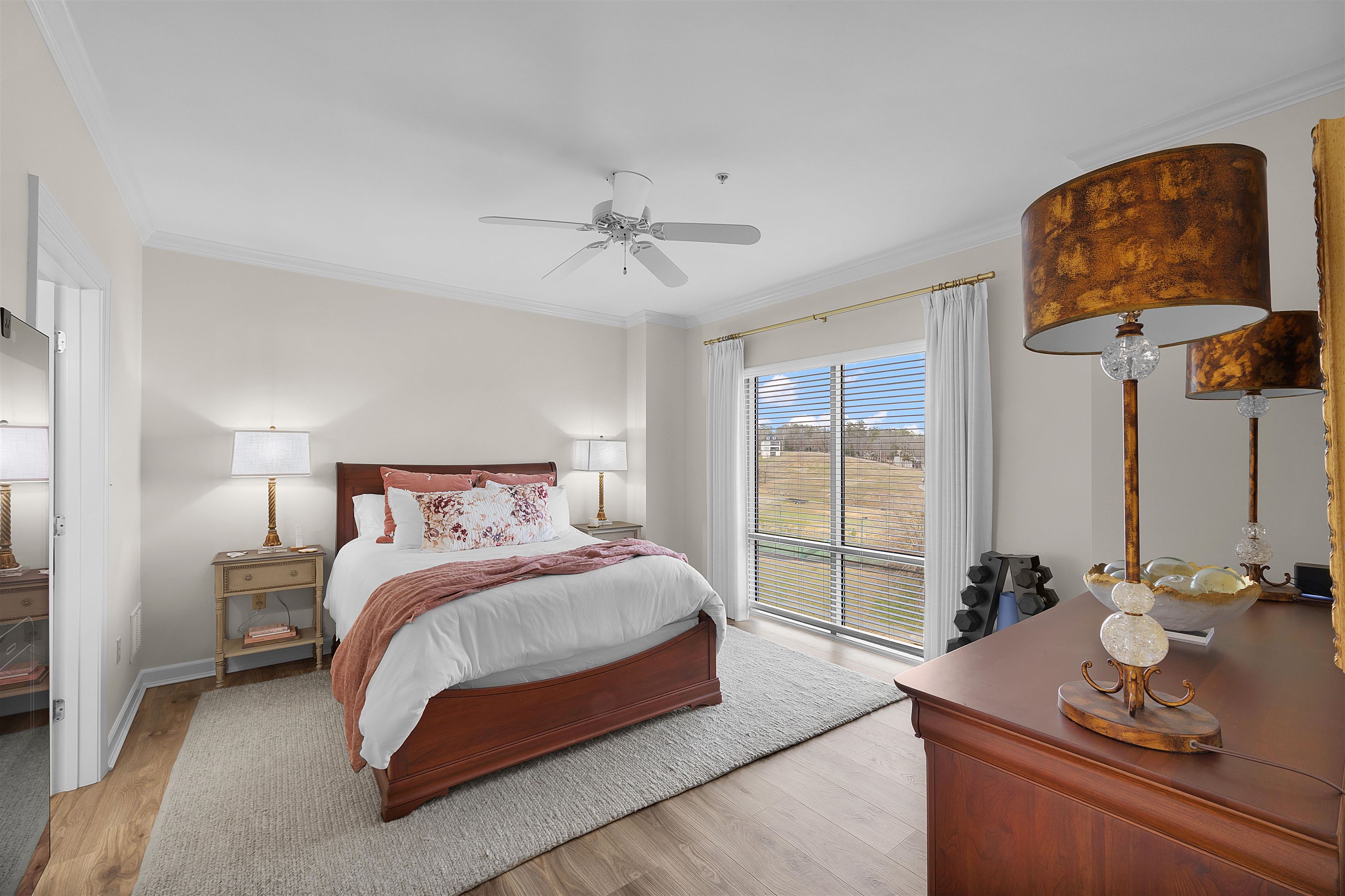 323 Cr 380 Road, Unit P 605 Iuka, MS 38852 - Photo 14 of 24 a bedroom with a bed and a chandelier