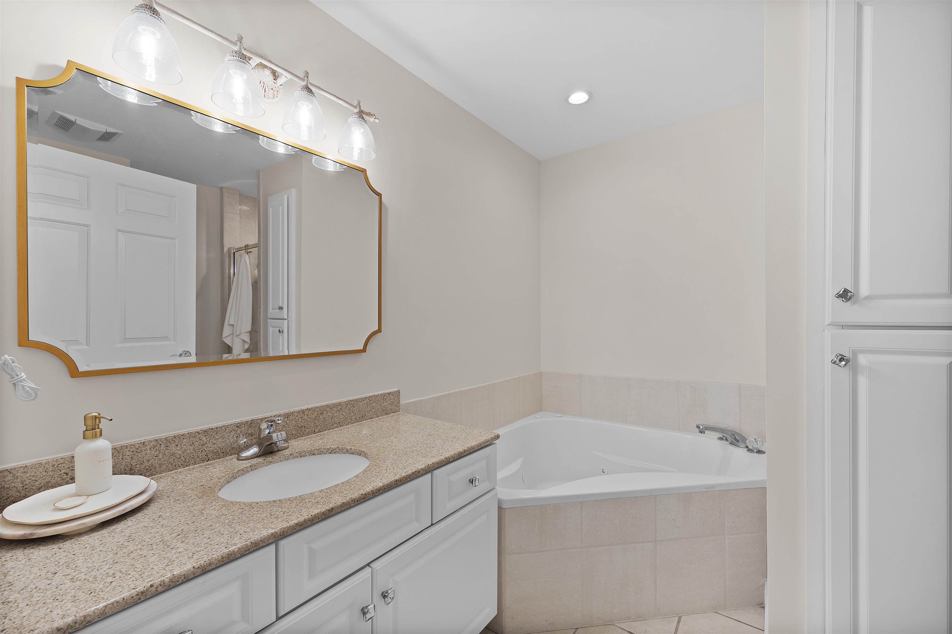 323 Cr 380 Road, Unit P 605 Iuka, MS 38852 - Photo 15 of 24 a bathroom with a granite countertop sink and a mirror