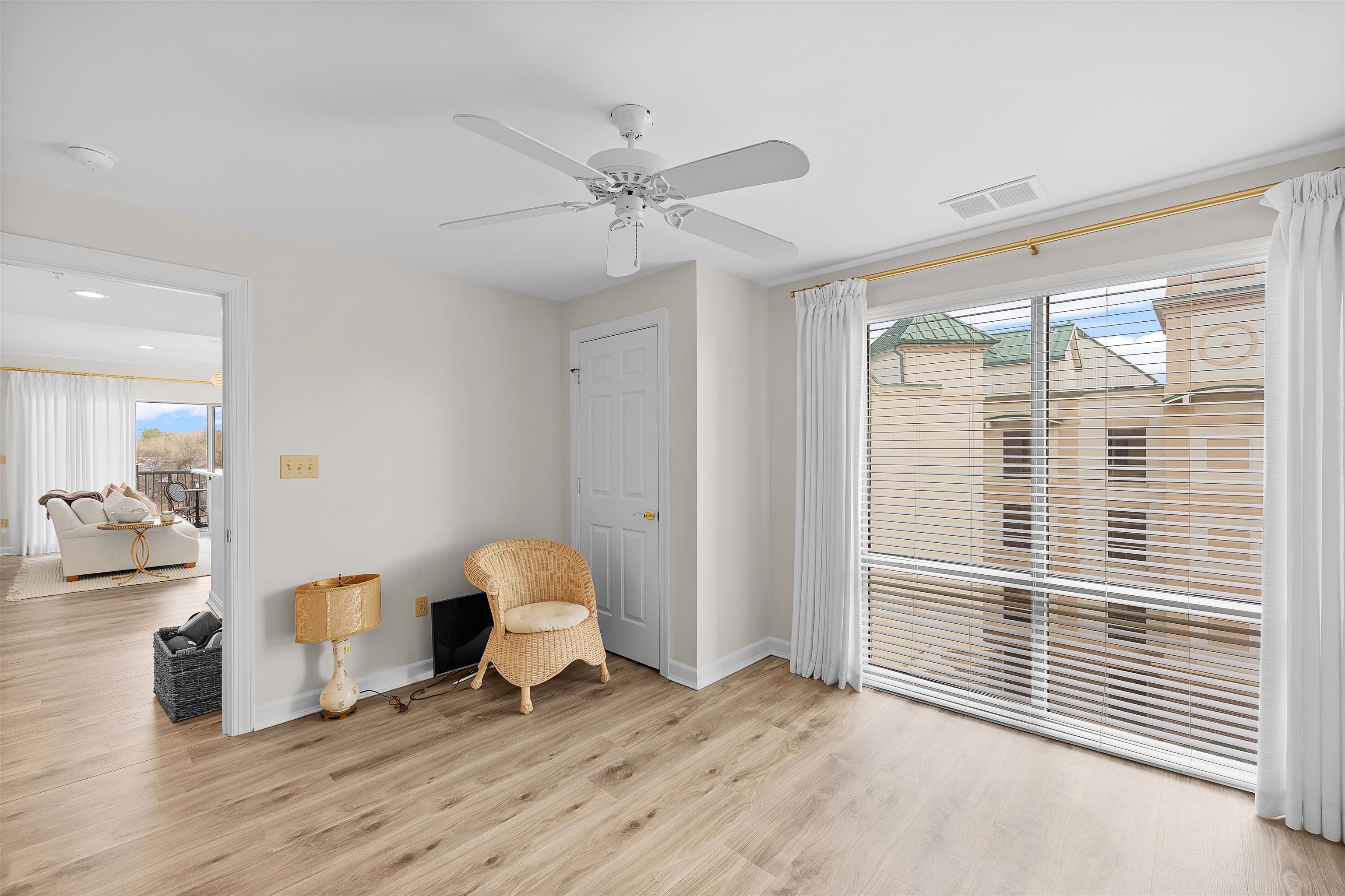 323 Cr 380 Road, Unit P 605 Iuka, MS 38852 - Photo 17 of 24 a view of a livingroom with a large window and wooden floor