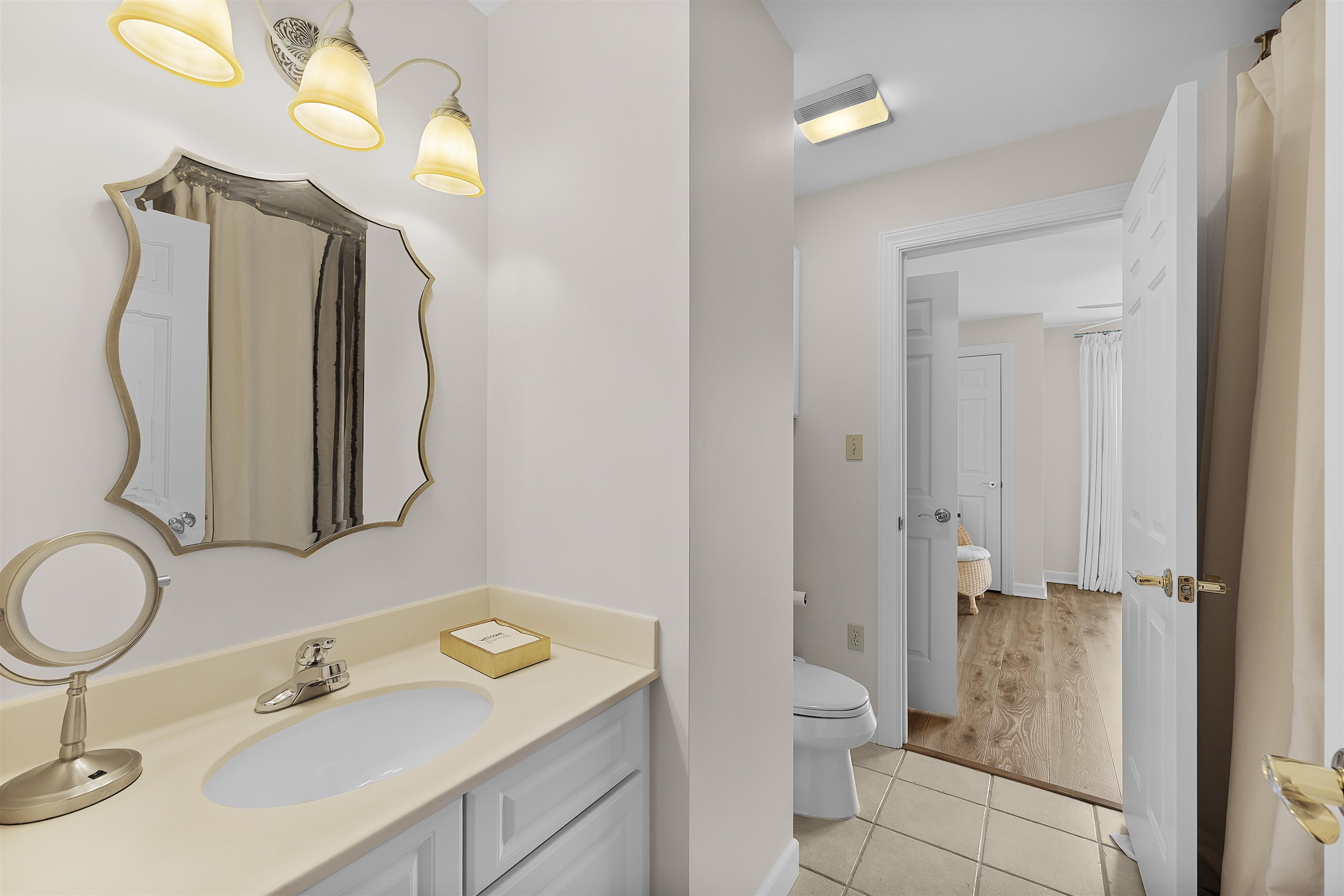 323 Cr 380 Road, Unit P 605 Iuka, MS 38852 - Photo 20 of 24 a bathroom with a sink vanity toilet and shower