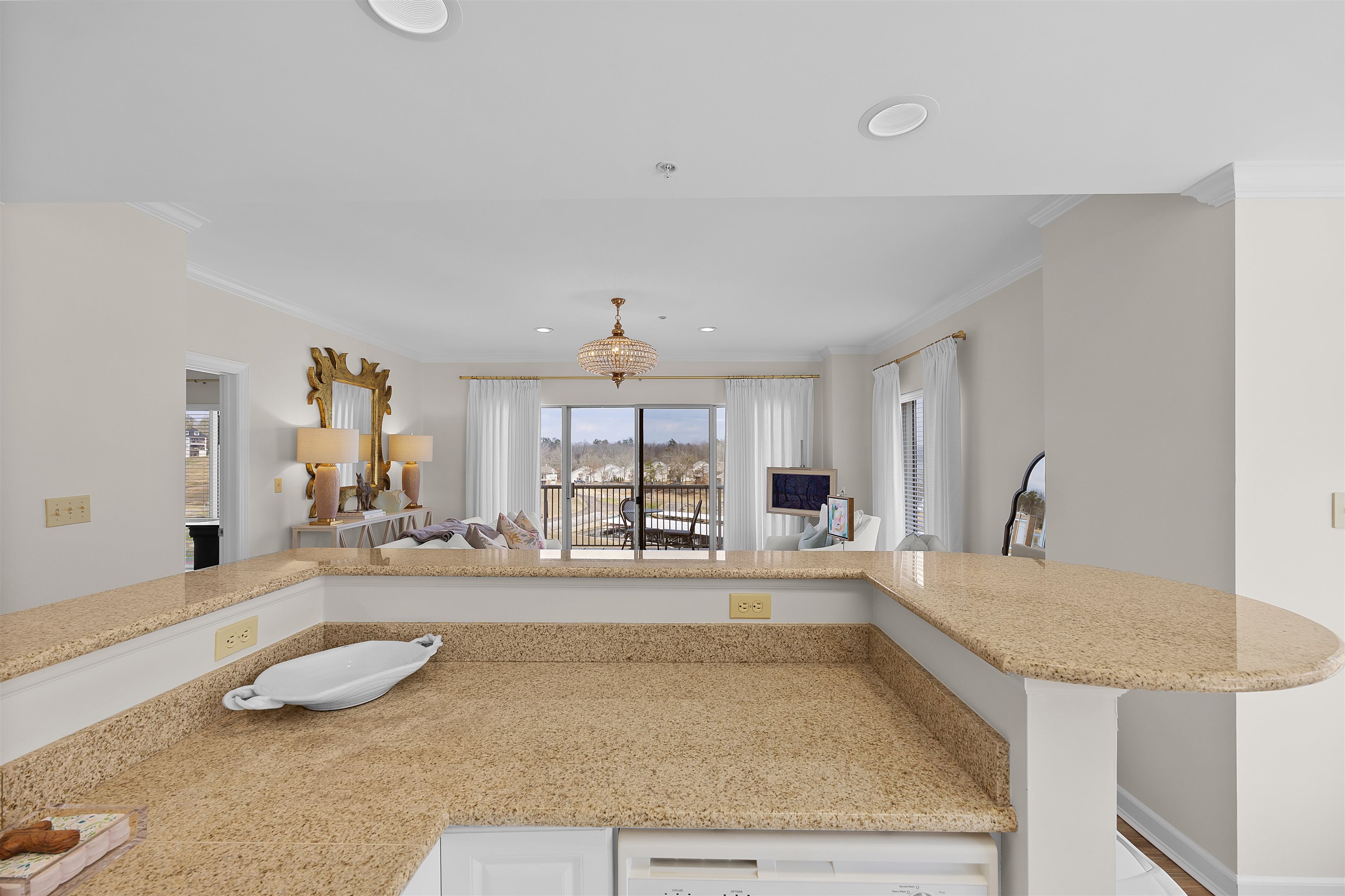 323 Cr 380 Road, Unit P 605 Iuka, MS 38852 - Photo 24 of 24 a large white kitchen with a large window and kitchen island