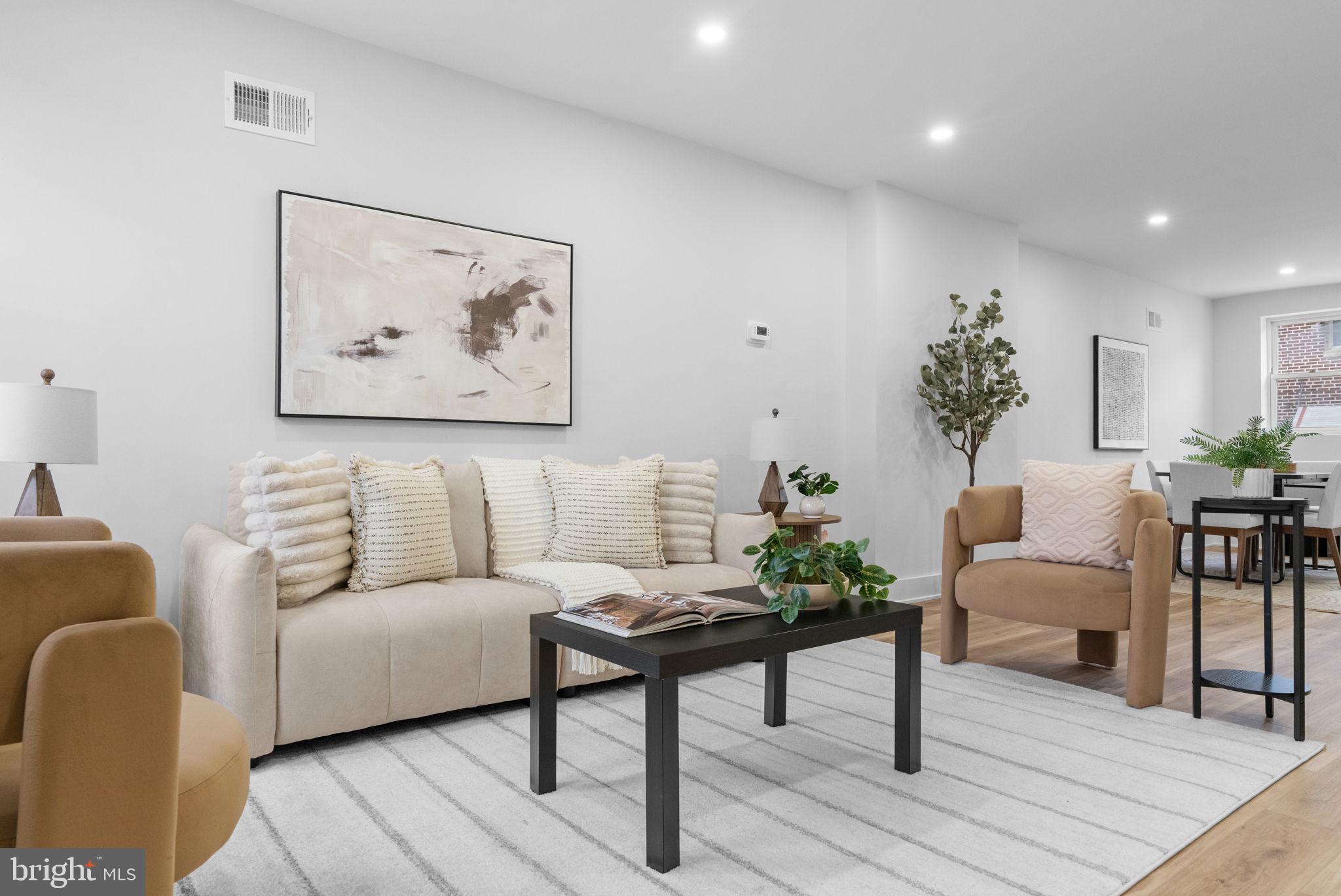 4233 Passmore Street Philadelphia, PA 19135 - Photo 2 of 30 a living room with furniture and wooden floor