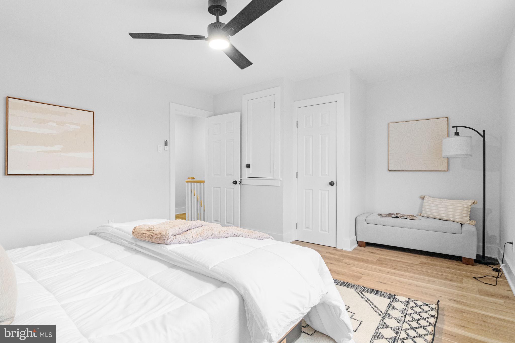 4233 Passmore Street Philadelphia, PA 19135 - Photo 22 of 30 a bedroom with a bed and a couch