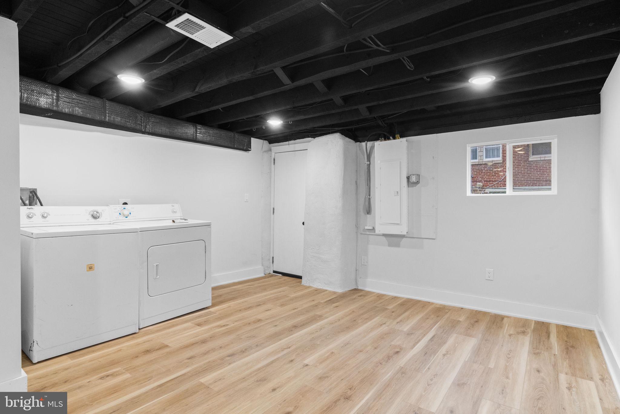 4233 Passmore Street Philadelphia, PA 19135 - Photo 26 of 30 a utility room with a sink dryer and washer