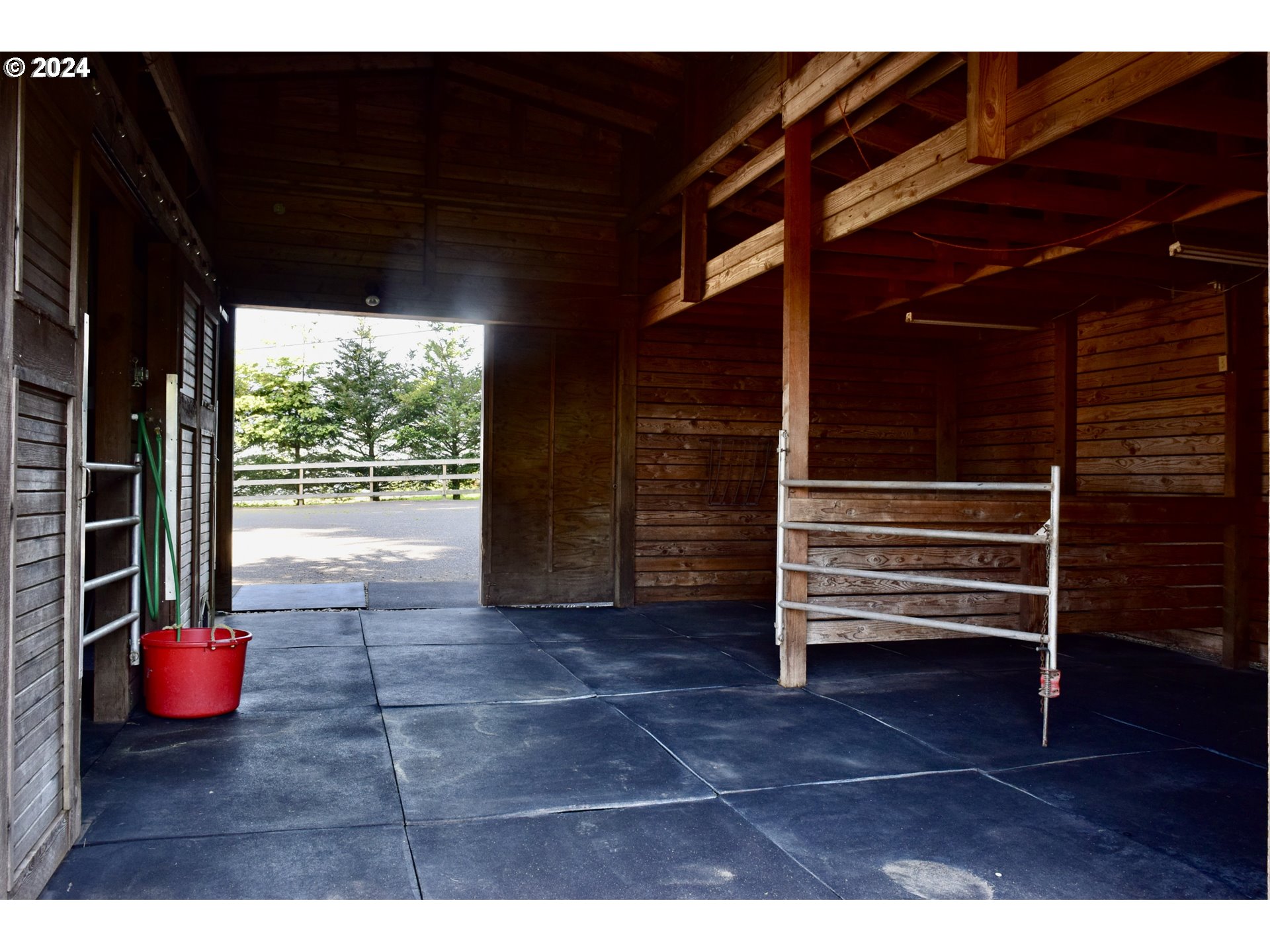 27286 Eighty Acres Road Gold Beach, OR 97444 - Photo 17 of 46 a view of room with wooden floor and windows