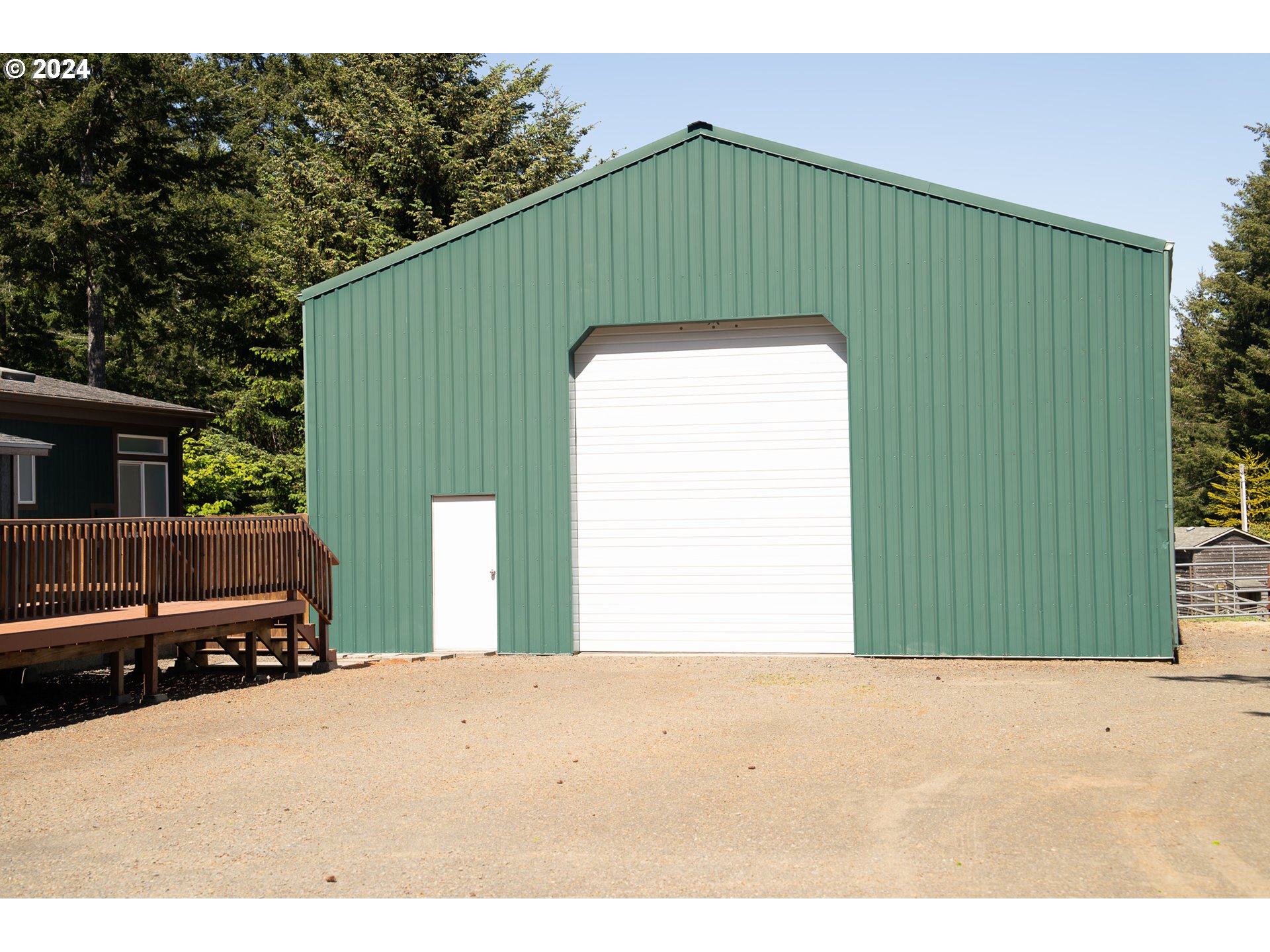 27286 Eighty Acres Road Gold Beach, OR 97444 - Photo 30 of 46 a house view with a outdoor space