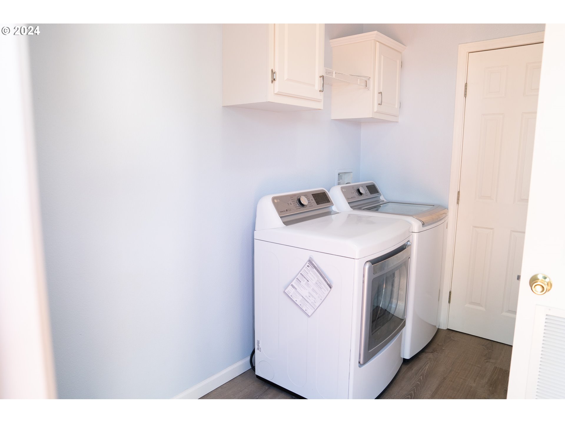 27286 Eighty Acres Road Gold Beach, OR 97444 - Photo 31 of 46 a utility room with dryer and washer
