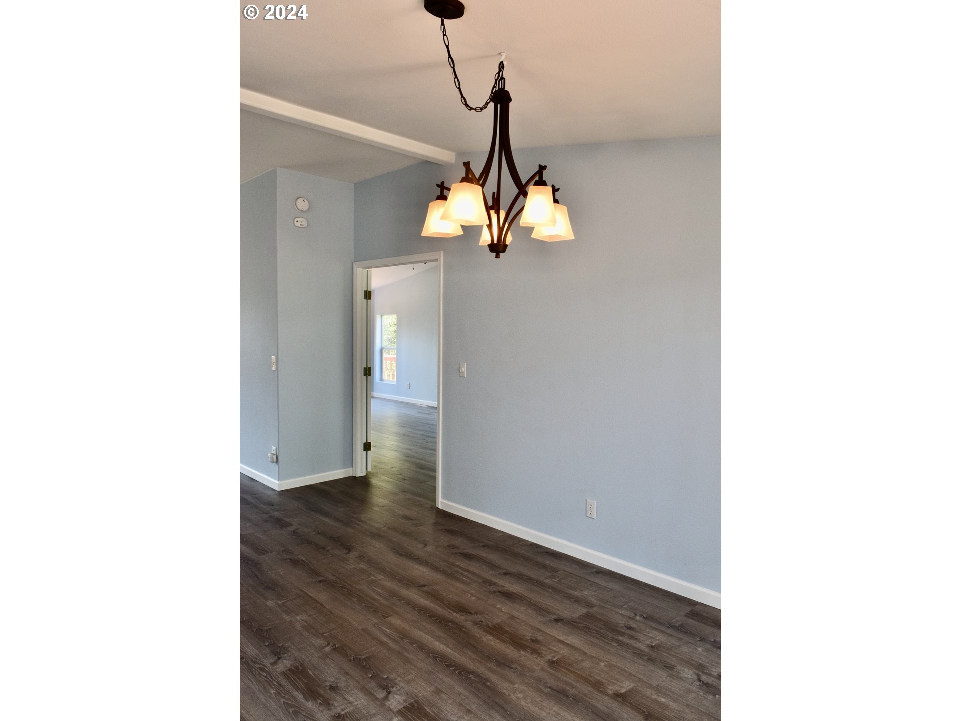27286 Eighty Acres Road Gold Beach, OR 97444 - Photo 10 of 46 a view of a room with wooden floor