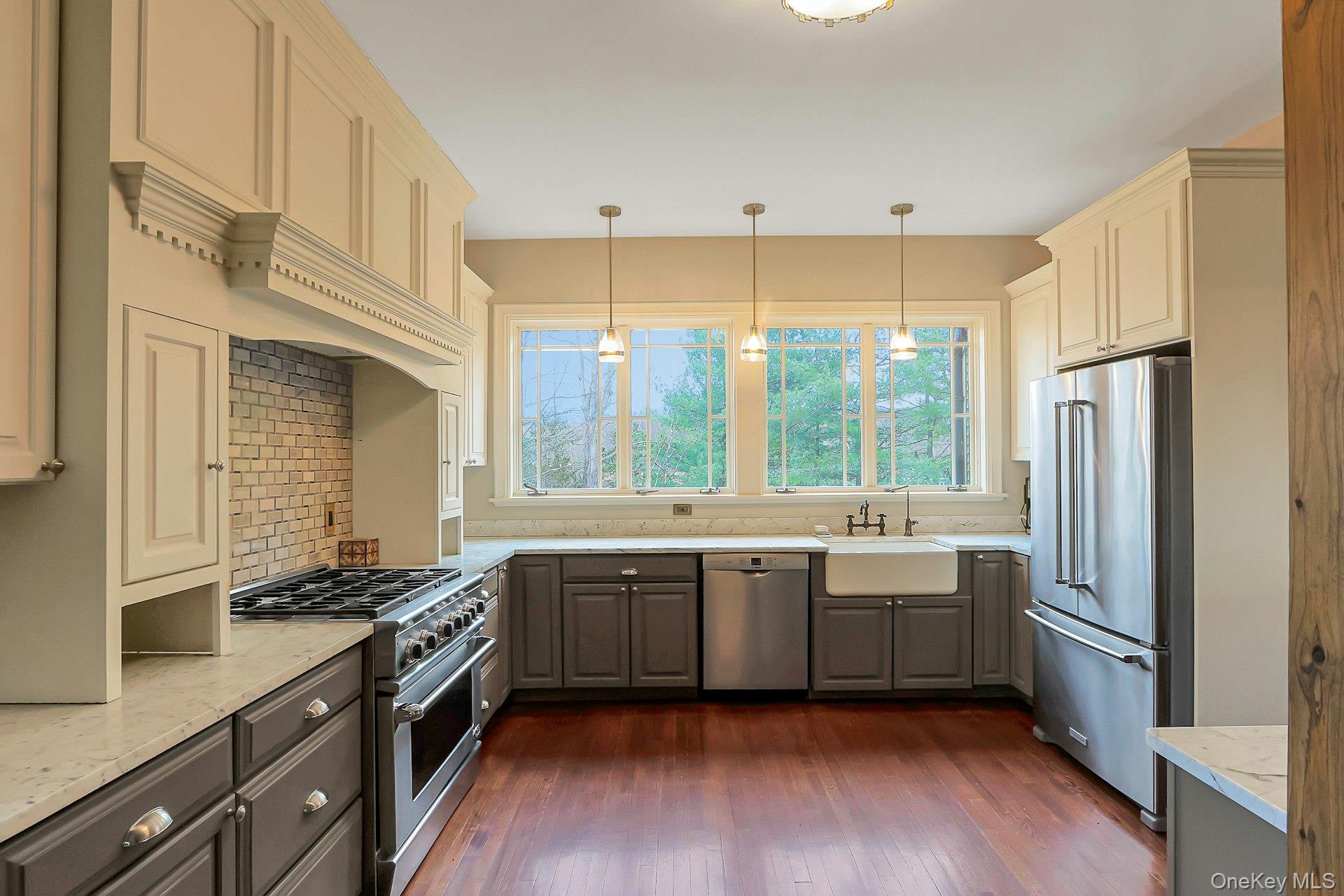 2 Pine Hill Road Chester, NY 10918 - Photo 14 of 36 a large kitchen with stainless steel appliances granite countertop a sink and a stove