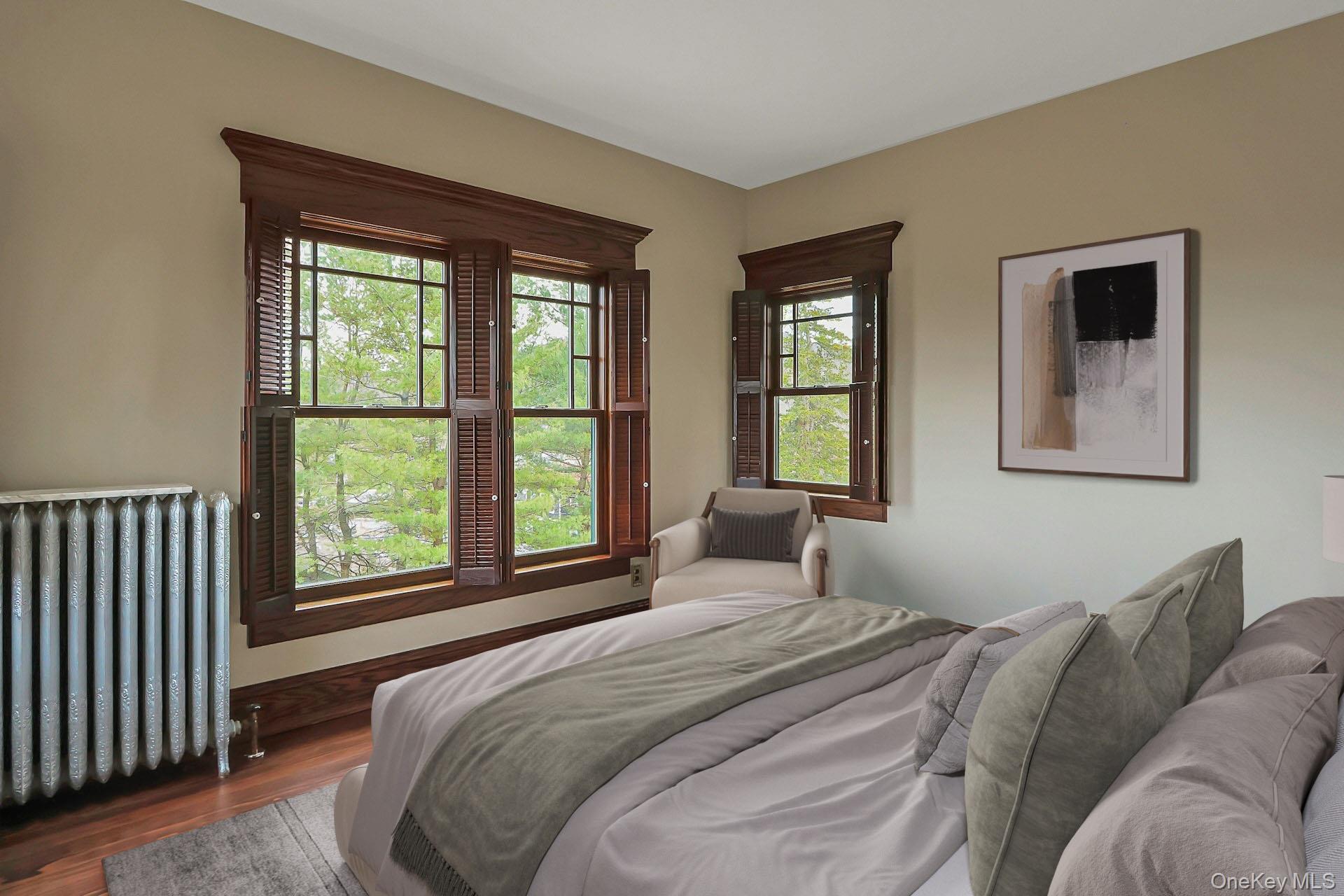2 Pine Hill Road Chester, NY 10918 - Photo 23 of 36 a bedroom with a large bed and a window