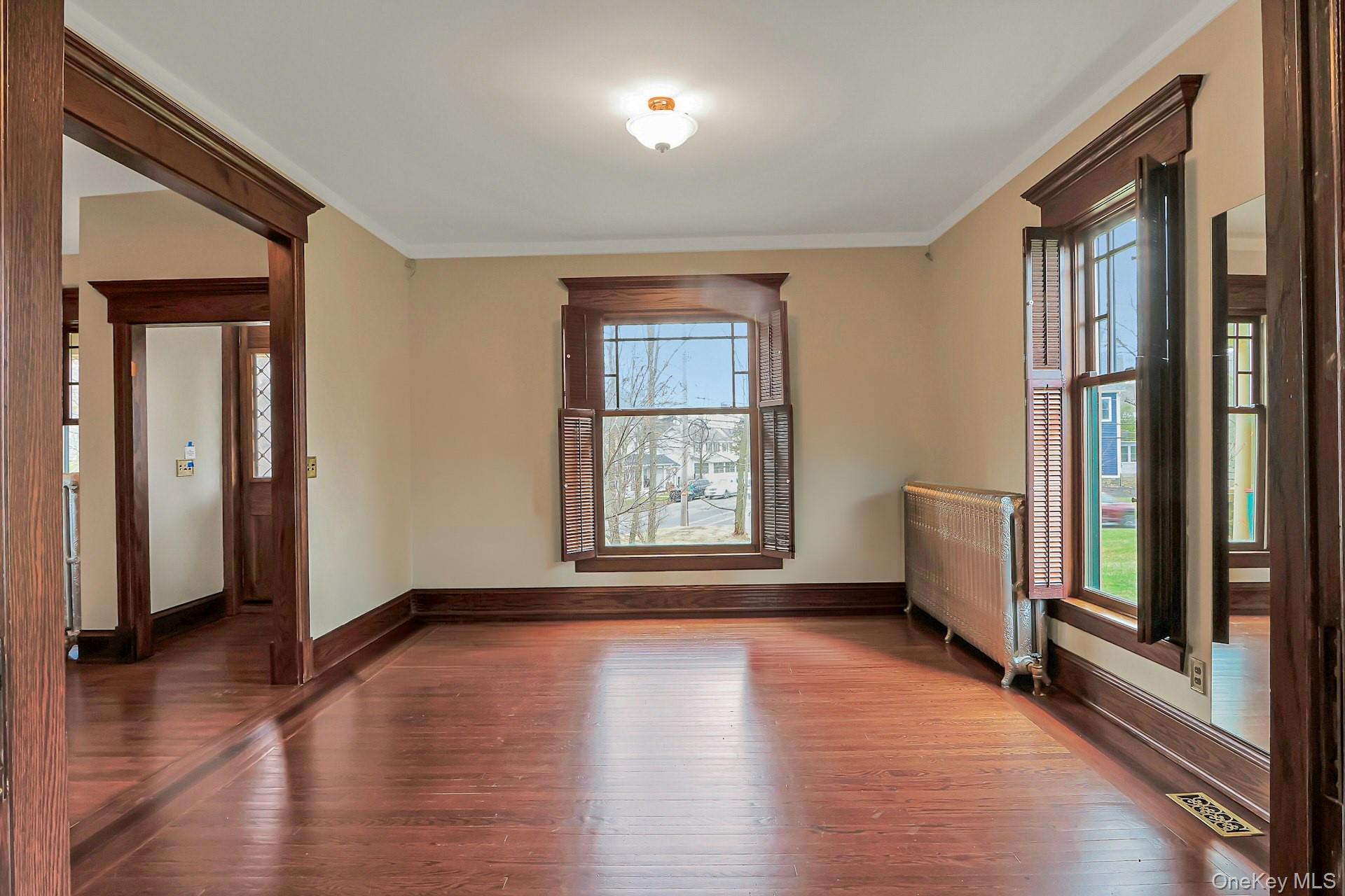 2 Pine Hill Road Chester, NY 10918 - Photo 6 of 36 an empty room with wooden floor and windows