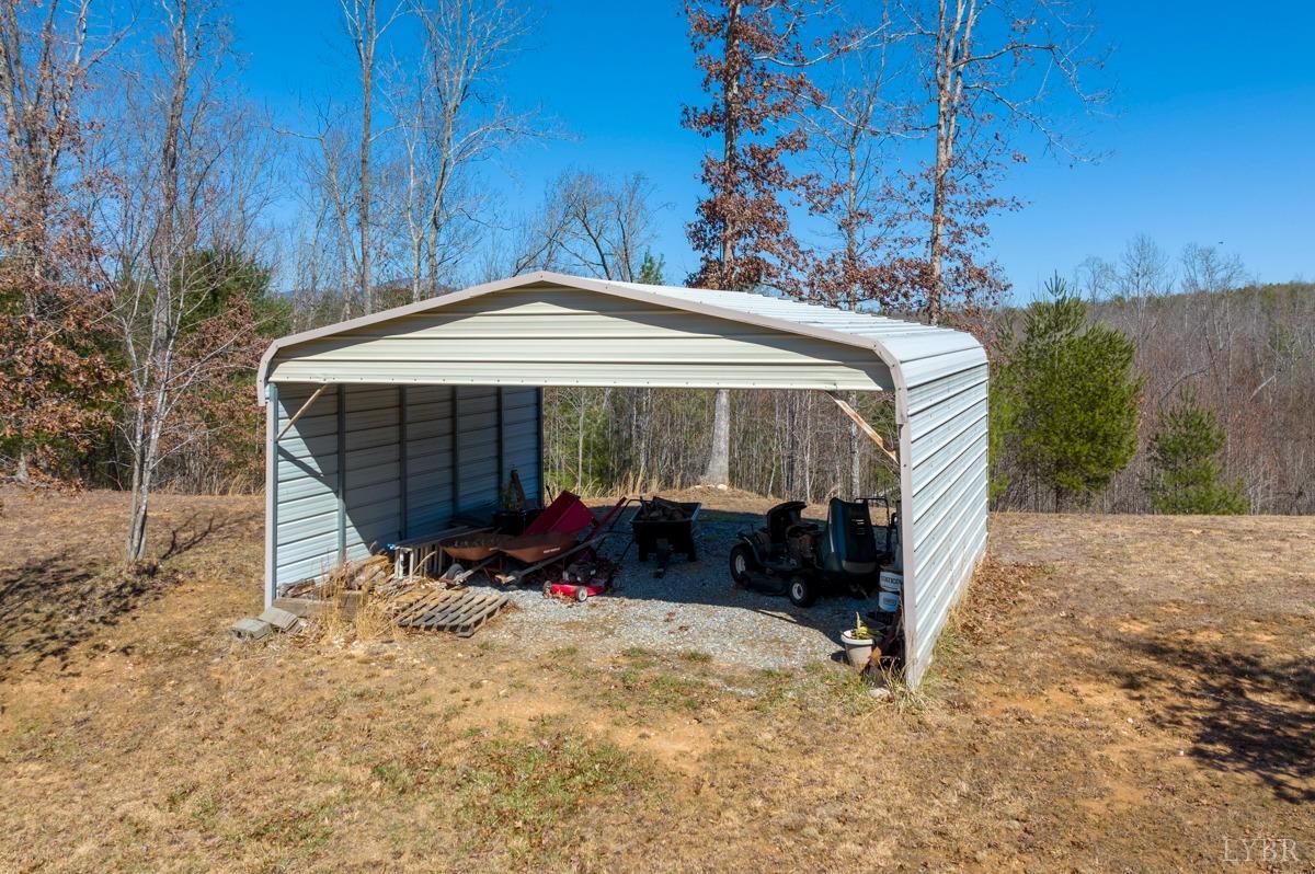 5687 Elon Road Monroe, VA 24574 - Photo 25 of 60 a front view of a house with garden